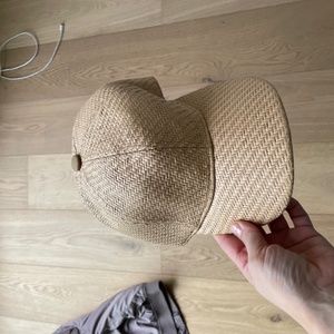 tan baseball cap